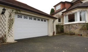 DuraTherm Insulated Georgian Sectional Garage Door in White with windows installed