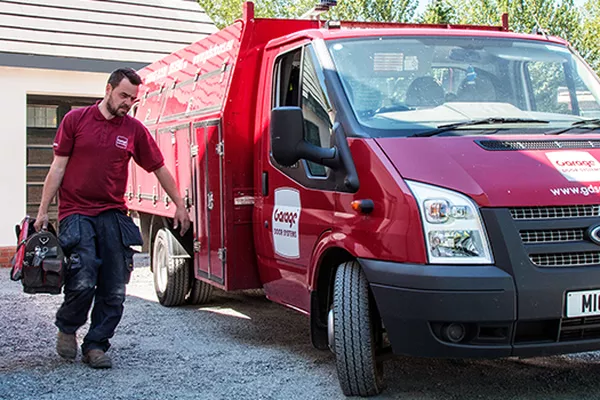 Man leaving a property after an installation job